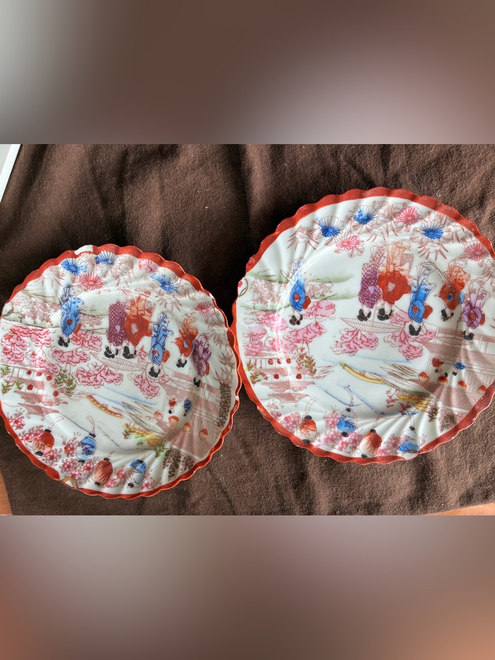 This specific item is a vintage Japanese "Geisha Girl" porcelain export plate